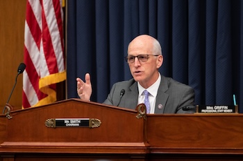 Congressman Adam Smith speaking in a hearing