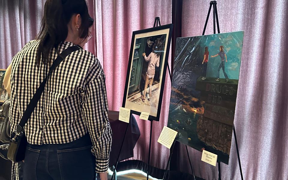 person looking at art